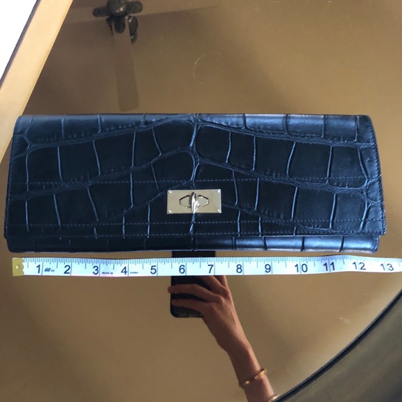 Givenchy Handbags - AUTHENTIC Givenchy shark tooth closure clutch